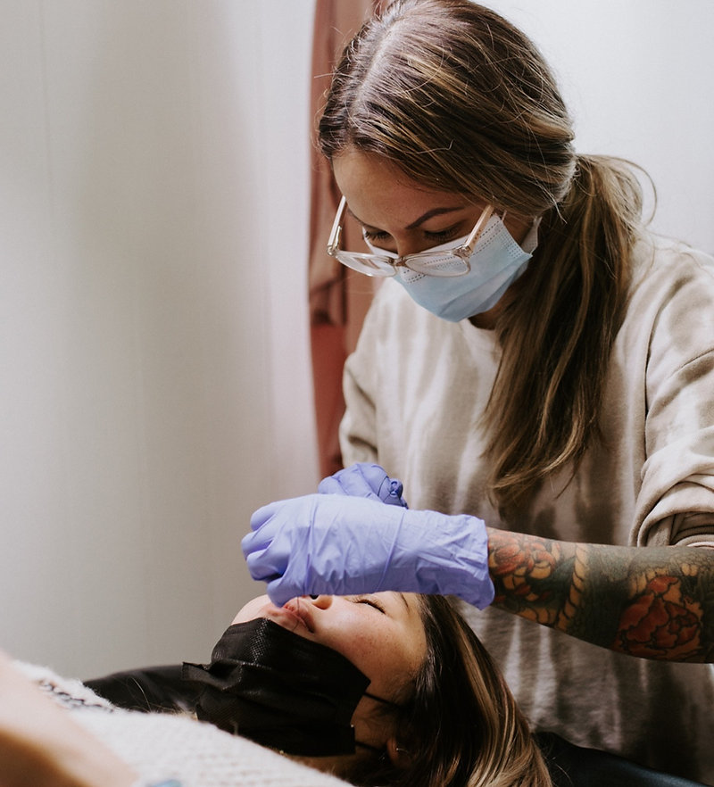 Tanai performing lash service